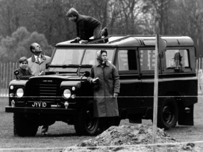 queen-elizabeth-ii-looks-on-as-prince-edward-plays-on-the-roof-of-their-land-rover.jpg